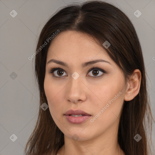 Neutral white young-adult female with long  brown hair and brown eyes