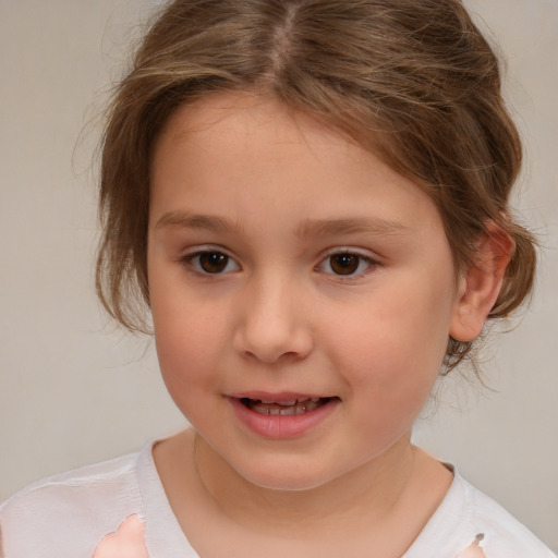 Joyful white child female with medium  brown hair and brown eyes