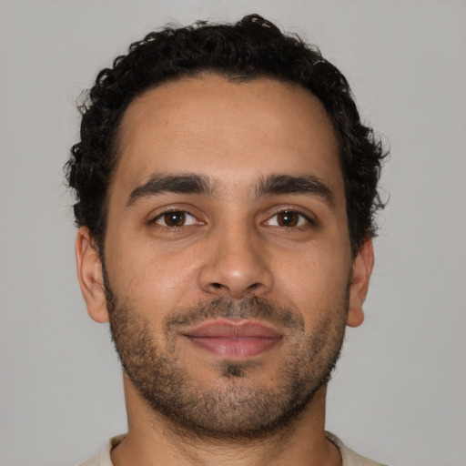 Neutral latino young-adult male with short  brown hair and brown eyes
