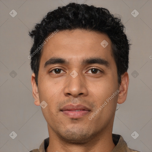 Neutral latino young-adult male with short  black hair and brown eyes