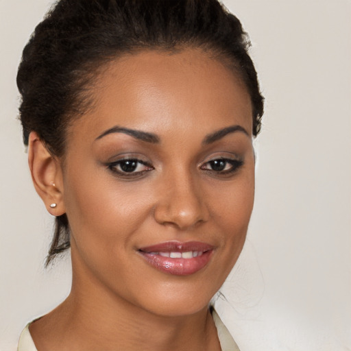 Joyful latino young-adult female with short  brown hair and brown eyes