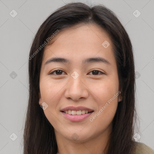 Joyful white young-adult female with long  brown hair and brown eyes