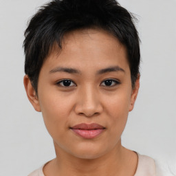 Joyful asian young-adult female with short  brown hair and brown eyes