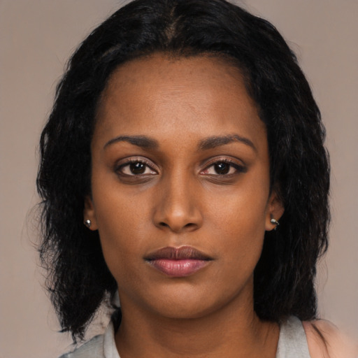 Neutral latino young-adult female with medium  black hair and brown eyes
