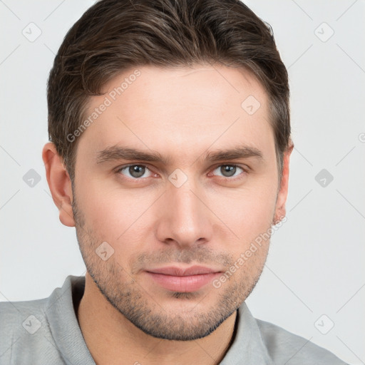 Neutral white young-adult male with short  brown hair and grey eyes