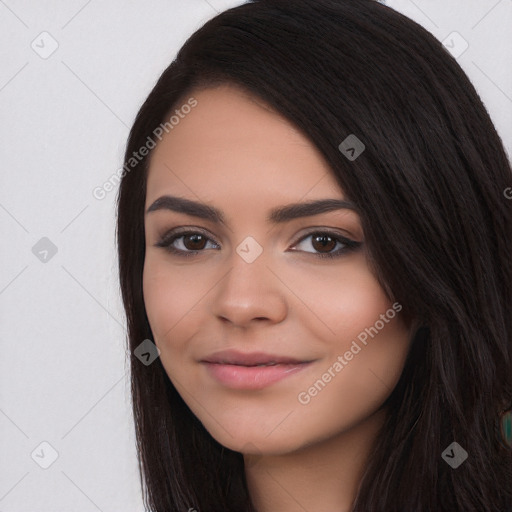 Joyful white young-adult female with long  black hair and brown eyes