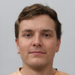 Neutral white young-adult male with short  brown hair and grey eyes