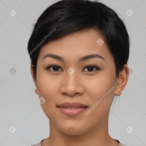 Joyful asian young-adult female with short  black hair and brown eyes