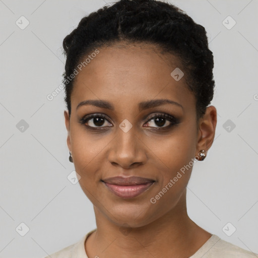 Joyful black young-adult female with short  black hair and brown eyes