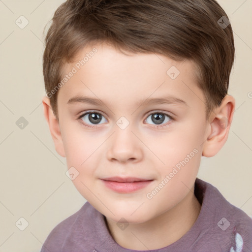 Joyful white child male with short  brown hair and brown eyes