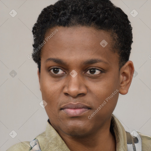 Joyful black young-adult male with short  brown hair and brown eyes