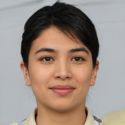 Joyful asian young-adult female with short  brown hair and brown eyes