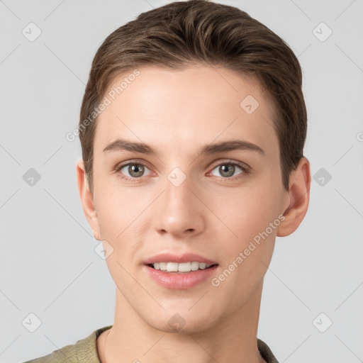 Joyful white young-adult female with short  brown hair and grey eyes