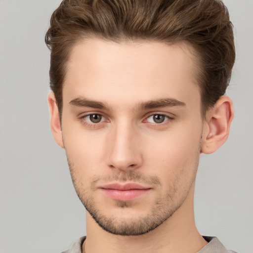 Neutral white young-adult male with short  brown hair and brown eyes