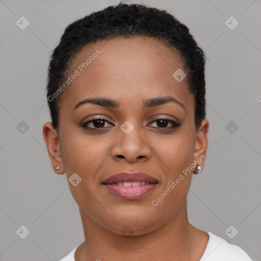 Joyful black young-adult female with short  brown hair and brown eyes