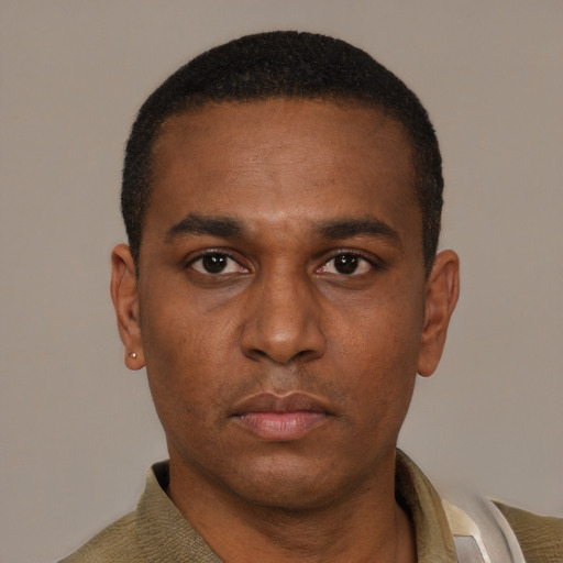 Neutral latino adult male with short  black hair and brown eyes