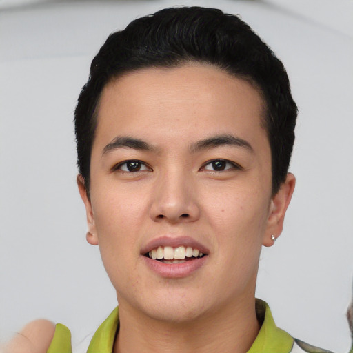 Joyful asian young-adult male with short  black hair and brown eyes