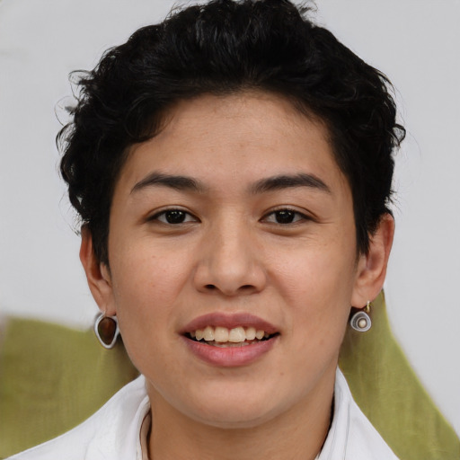 Joyful white young-adult female with short  black hair and brown eyes