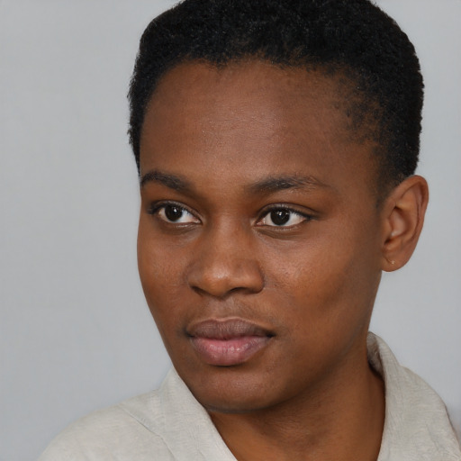 Neutral black young-adult female with short  black hair and brown eyes