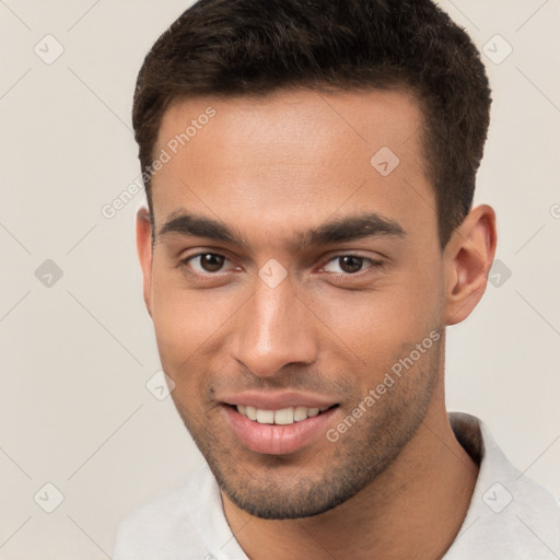 Joyful white young-adult male with short  brown hair and brown eyes