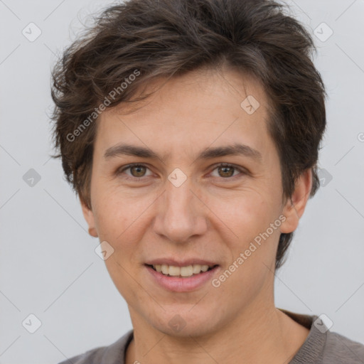 Joyful white adult female with short  brown hair and brown eyes