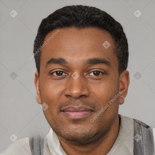 Joyful latino young-adult male with short  black hair and brown eyes