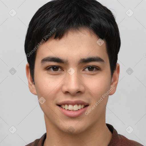 Joyful asian young-adult male with short  black hair and brown eyes