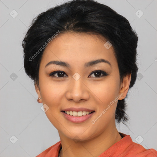 Joyful asian young-adult female with medium  black hair and brown eyes