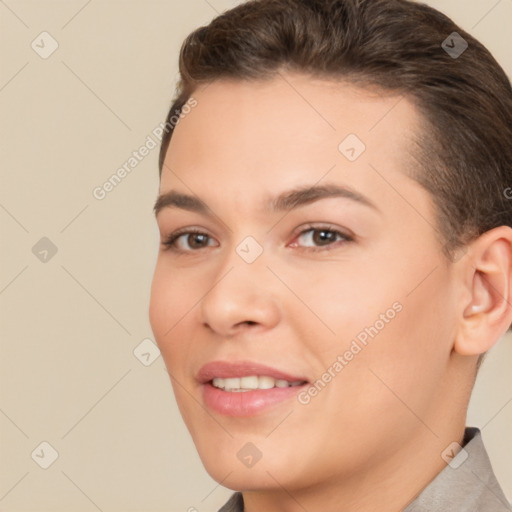 Joyful white young-adult female with short  brown hair and brown eyes