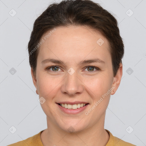 Joyful white young-adult female with short  brown hair and grey eyes