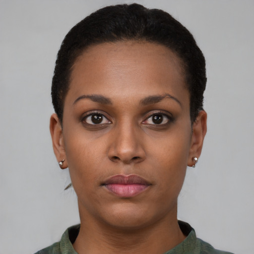 Neutral black young-adult female with short  brown hair and brown eyes