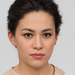 Neutral white young-adult female with short  brown hair and brown eyes