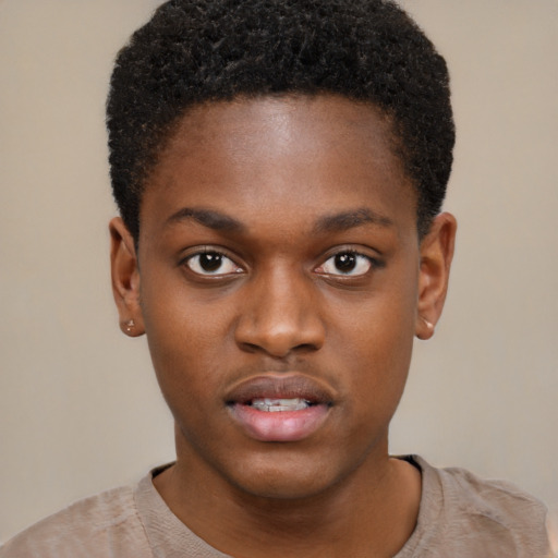 Neutral black young-adult male with short  black hair and brown eyes