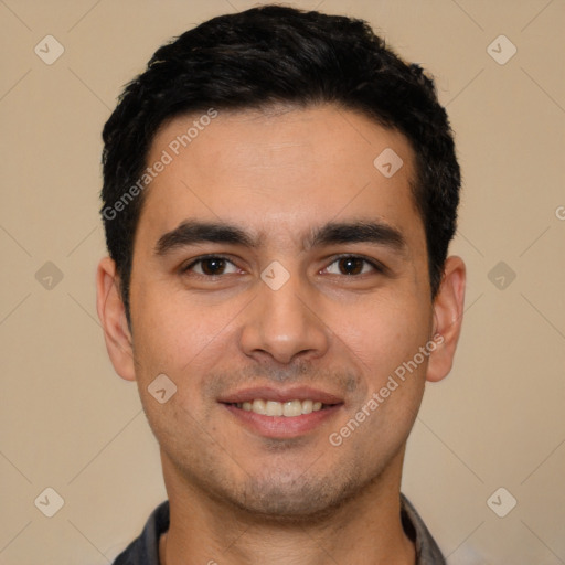 Joyful white young-adult male with short  black hair and brown eyes