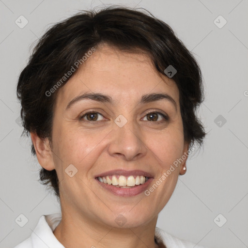 Joyful white adult female with medium  brown hair and brown eyes