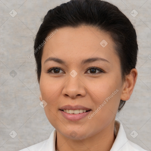 Joyful asian young-adult female with short  brown hair and brown eyes