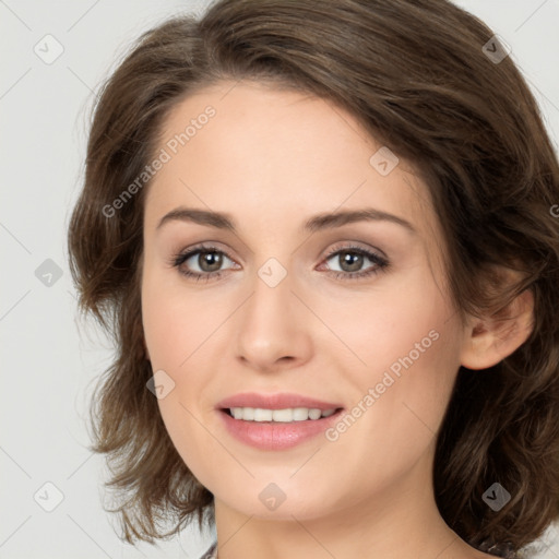 Joyful white young-adult female with medium  brown hair and green eyes