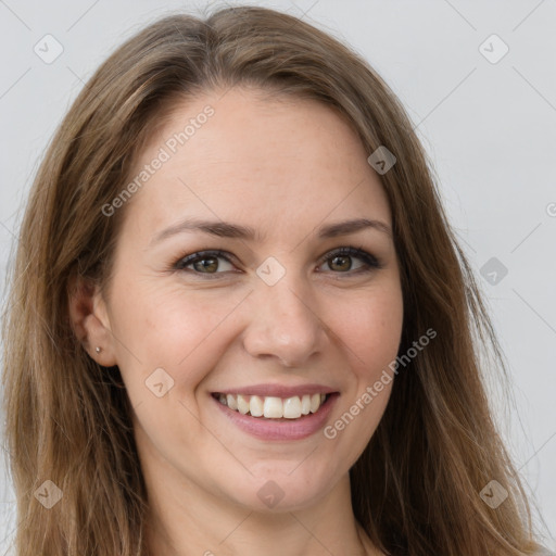 Joyful white young-adult female with long  brown hair and green eyes