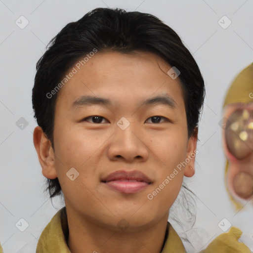 Joyful asian young-adult male with short  brown hair and brown eyes