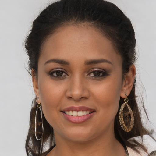 Joyful white young-adult female with long  brown hair and brown eyes