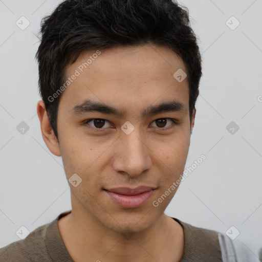 Joyful asian young-adult male with short  brown hair and brown eyes