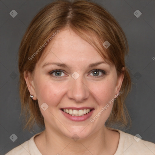 Joyful white young-adult female with medium  brown hair and blue eyes