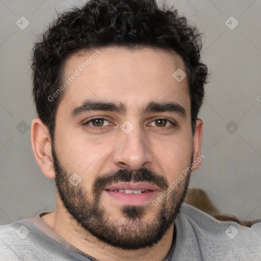 Joyful white young-adult male with short  black hair and brown eyes