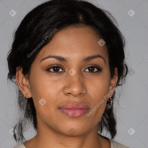 Joyful black young-adult female with medium  brown hair and brown eyes