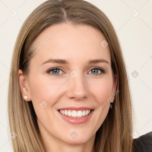 Joyful white young-adult female with long  brown hair and grey eyes