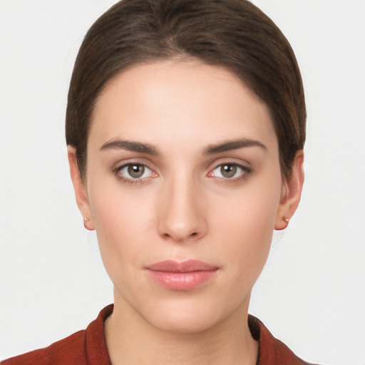 Neutral white young-adult female with short  brown hair and brown eyes