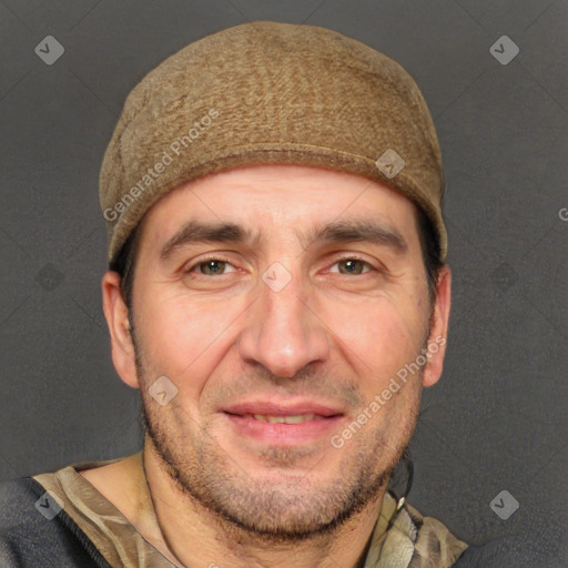 Joyful white adult male with short  brown hair and grey eyes