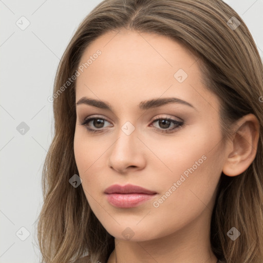 Neutral white young-adult female with long  brown hair and brown eyes