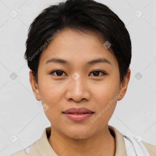 Joyful asian young-adult female with short  brown hair and brown eyes