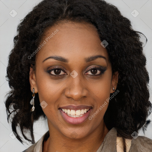 Joyful black young-adult female with long  brown hair and brown eyes